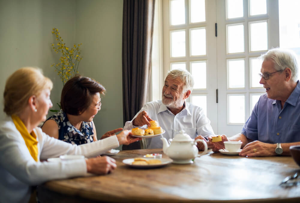 A group of friends enjoying tea together